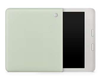 May include: A white tablet with a light green case. The tablet has a black screen and a camera on the back.