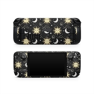 May include: Black handheld gaming console skin featuring a celestial design with suns, moons, and stars. The skin covers the entire console, including the buttons and screen. The design is repeated across the top and bottom of the console.