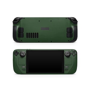 Może przedstawiać: Przenośna konsola do gier w kolorze ciemnozielonym, pokazana z przodu i z tyłu. Widok z przodu pokazuje czarny ekran, przyciski sterowania i logo "Steam". Widok z tyłu ujawnia otwór wentylacyjny i dodatkowe elementy sterujące. Czarne akcenty.