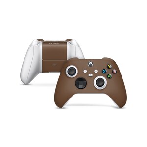 May include: A brown Xbox controller with white buttons and a white Xbox logo. The controller is shown from the front and is on a white background.