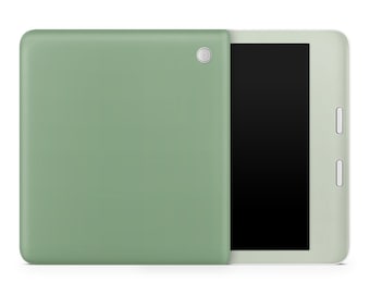 Könnte beinhalten: Eine grüne Tablethülle mit einem weißen Tablet im Inneren. Das Tablet hat einen schwarzen Bildschirm und eine silberne Kamera auf der Rückseite.