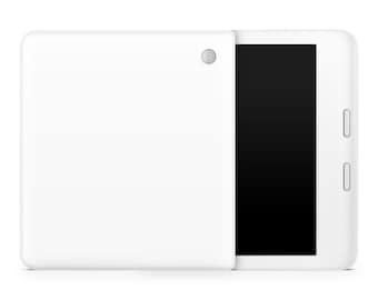 May include: White tablet computer with a black screen. The tablet is closed and the back is visible. The tablet has a camera on the back.