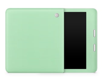 Könnte beinhalten: Ein hellgrünes Tablet-Computer mit einem schwarzen Bildschirm und einer weißen Einfassung. Das Tablet ist geschlossen und die Rückseite ist sichtbar.