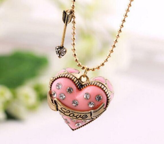 Locket with ring inside sale