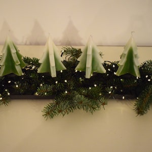 green snowy green blue Christmas tree candles, Advent candles