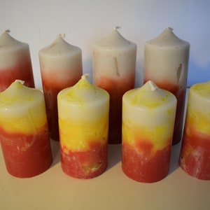 Advent candles pillar candles in red white and yellow red white in two sizes (15 cm and 11 cm respectively)