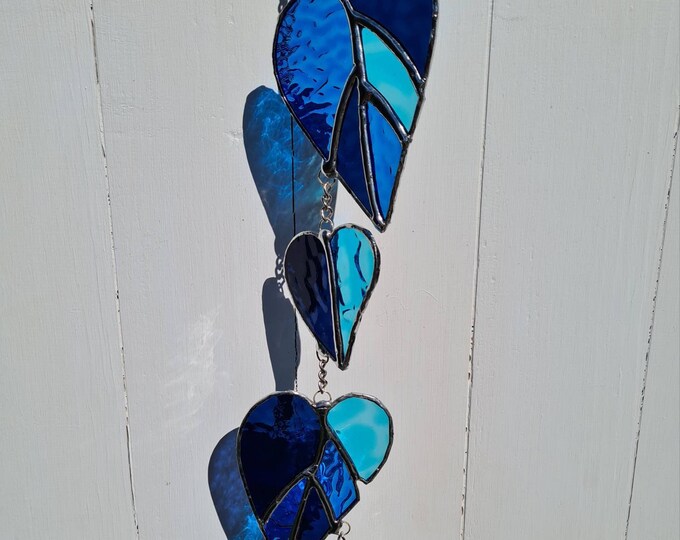 Curated visual reference: Recycled Glass Artistic Materials Off Grid Reference: Stained Glass Suncatcher Devils Ivy Pothos Vine Retro 70S Wall