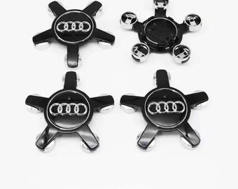 Audi 135 mm / 59 mm Negro – 4 tapacubos centrales 4F0601165N