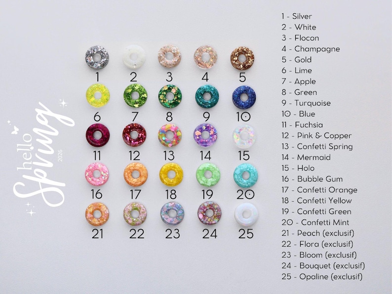 May include: A collection of 25 colorful, donut-shaped beads with glitter and confetti accents. Each bead is labeled with a number and color name, including silver, gold, and turquoise. The words "hello Spring 2020" are written in cursive.