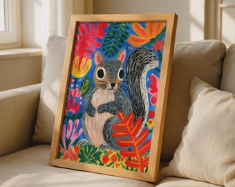 May include: A framed art print featuring a gray squirrel with large eyes centered against a vibrant blue background filled with stylized, colorful tropical leaves and flowers in shades of pink, orange, yellow, and green, enclosed in a light wood frame.