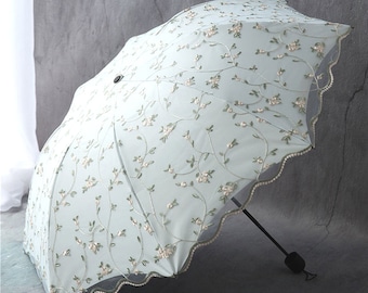 Sombrilla con bordado floral: protección UV, protección solar y contra la lluvia