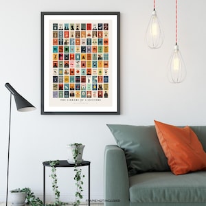 May include: A black framed poster with a white background and colorful book covers. The poster is titled "The Library of a Lifetime".