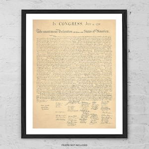 May include: A framed print of the Declaration of Independence. The document is displayed on aged paper with black text and signatures. The title reads "In Congress, July 4, 1776. The unanimous Declaration of the thirteen united States of America."