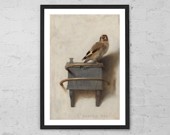 May include: Framed print of a painting depicting a small bird perched on a dark grey box-like structure with curved metal details. The bird has brown, tan, and yellow feathers. The artwork is set against a light background.