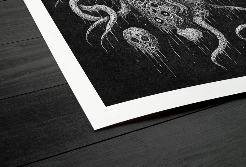 May include: Monochrome art print depicting a detailed, abstract creature with tentacles and multiple eyes. The artwork is set against a dark background with a white border, creating a striking contrast.