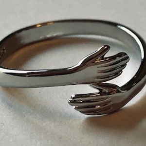 Verstelbare Love Hug Ring 925 sterling verzilverd Gratis Britse verzending afbeelding 2
