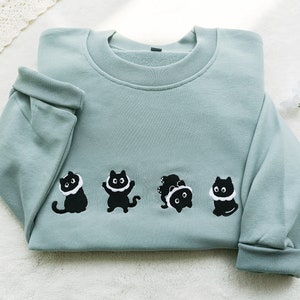 素敵な黒猫の刺繍入りスウェットシャツ、クルーネックスウェットシャツ、女性用猫シャツ、猫好きのスウェットシャツ、猫好きへのギフト