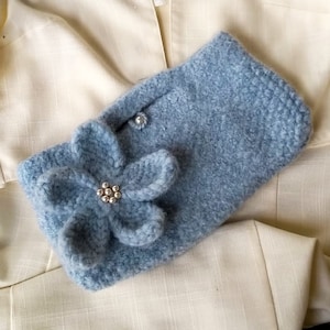Special occasion clutch bag in pale blue  100% wool hand knitted and felted with matching flower pin