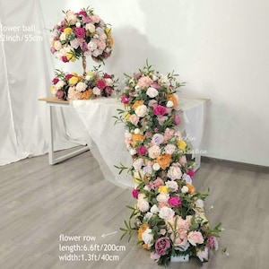May include: A display of artificial floral arrangements. A large flower ball (22 inches/55cm) and a flower row (length 6.6 feet/200cm, width 1.3 feet/40cm) are shown. The flowers are in shades of pink, yellow, orange, and white.