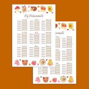 K&ouml;nnte beinhalten: Zwei wei&szlig;e Messprotokollbl&auml;tter mit dem Text "My Measurements" und herbstlichen Illustrationen. Die Bl&auml;tter enthalten Abschnitte zur Aufzeichnung von K&ouml;rperma&szlig;en &uuml;ber mehrere Monate, wie z. B. linker Arm, Brust und Taille.
