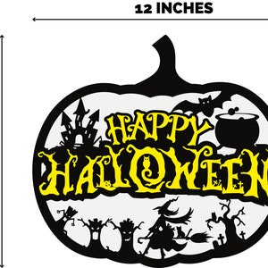 May include: Black and white silhouette of a pumpkin with the words "Happy Halloween" in yellow. The pumpkin is decorated with a haunted house, a bat, a witch, a cauldron, and trees. The pumpkin is 12 inches wide and 10.95 inches tall.