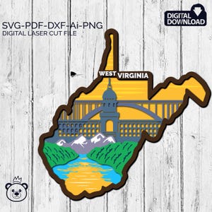 May include: A digital cut file design of the state of West Virginia with a yellow sunset background, a bridge, a river, mountains, and the text "WEST VIRGINIA".
