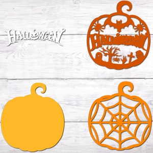 May include: Four orange pumpkin-shaped Halloween decorations. Two are plain, one has a spiderweb design, and one has a graveyard scene with the word "Halloween" written inside.