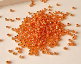 Toho Seed Beads 11/0, Glasperlen Rocailles 2 mm, 5 g,  Grundpreis je KG 440,- Euro, grapefruit opal m. Silbereinzug