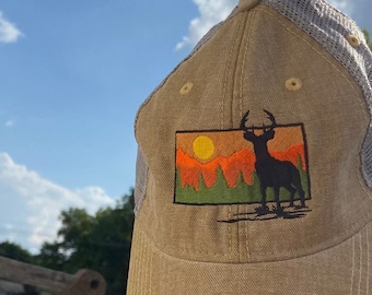 Embroidered Deer Sunset Scene Legacy Trucker Hat