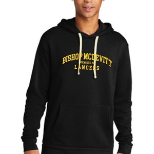 May include: Black hooded sweatshirt with a yellow embroidered logo that reads "Bishop McDevitt Wyncote, PA Lancers".