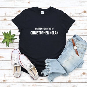 Written and Directed by Christopher Nolan T-shirt, multiple colour tees, womens sizes, movie clothing, movie gift idea