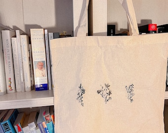 Borsa tote con stampa floreale intagliata a mano