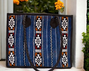 Artisan Woven Rug Tote Bag with Black Leather Braided Handles and Aztec-Inspired Design for Unique Boho Flair