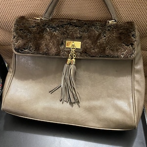 Aldo gold deals clutch