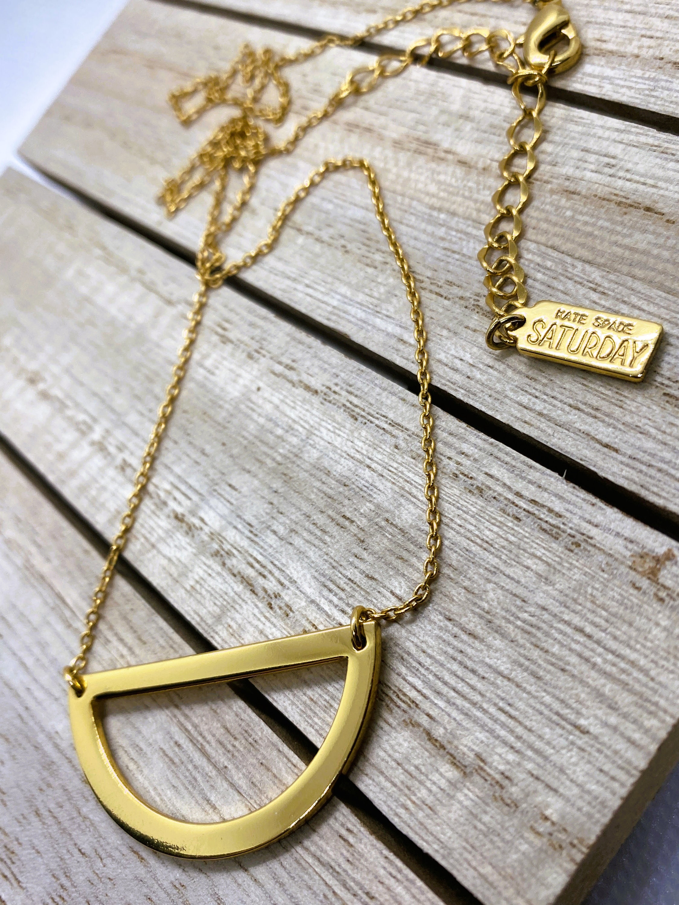 Gold Toned Kate Spade Saturday Half 