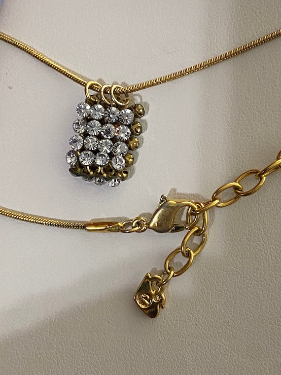 Vintage - Swarovski crystals pendants on a gold to
