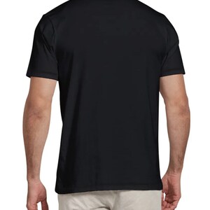 May include: A black short-sleeved t-shirt with a crew neck.