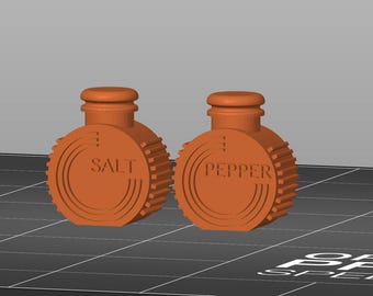 May include: Two orange salt and pepper shakers. The round shakers have a ridged design and a screw-on top. The word "SALT" is printed on one shaker, and the word "PEPPER" is printed on the other.