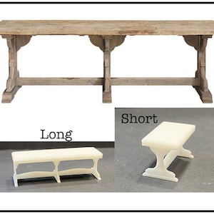 May include: A rustic wooden table with a long, rectangular top and a simple, sturdy base. Two matching benches are shown, one long and one short, with a similar design to the table.