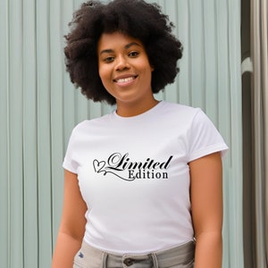 May include: White t-shirt with a black graphic that says "Limited Edition" with a heart symbol.