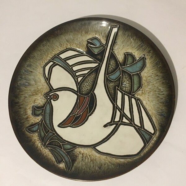 Large Studio decorative  pottery plate with white dove motif and g or 9 on rear. Age estimated at circ 1970s