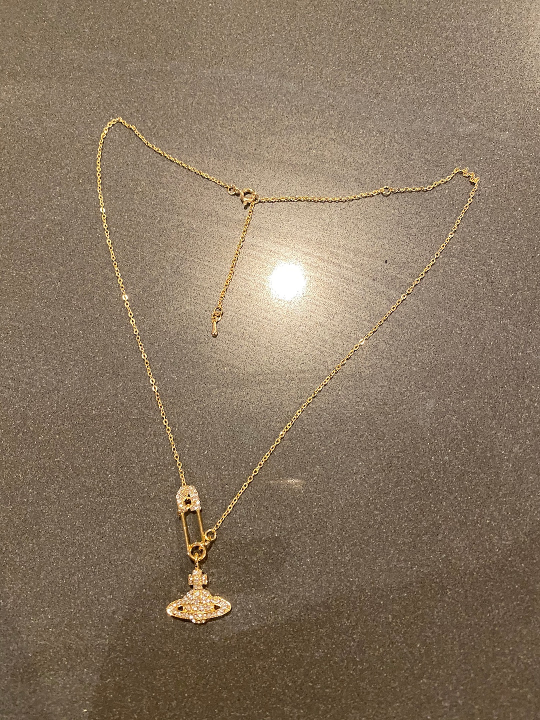 vivienne westwood necklace tarnishing : r/jewelry