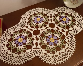 Available; 40cmx29cm oval doily