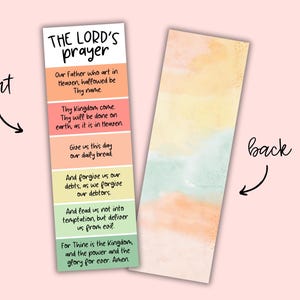 May include: Two bookmarks with the text "THE LORD'S prayer" on the front. The front bookmark has the prayer printed on colorful blocks. The back bookmark has a watercolor design in shades of yellow, orange, and green.
