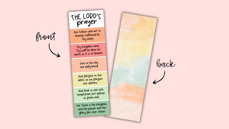 May include: Two bookmarks with the text "THE LORD'S prayer" on the front. The front bookmark has the prayer printed on colorful blocks. The back bookmark has a watercolor design in shades of yellow, orange, and green.