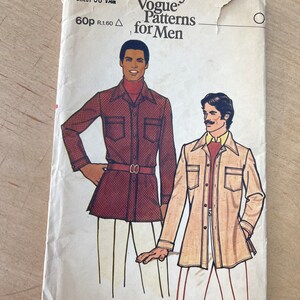 May include: A vintage sewing pattern envelope featuring two men wearing shirts. The envelope is labelled "Very Easy Vogue Patterns for Men" and has the number 8668 printed on it. The text "Chest 38 97cm" and "60p R1.60" is also printed on the envelope.