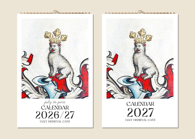 May include: Two calendars featuring a medieval-style illustration of a white cat wearing a gold crown. The calendars are labeled "CALENDAR 2026/27" and "CALENDAR 2027" with the text "UGLY MEDIEVAL CATS" below the dates. The illustrations have red, white, and blue accents.