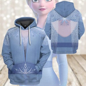 A hooded blue jacket with a design featuring a snowflake pattern and a hood. The jacket is shown from two different angles, with the front and back views.