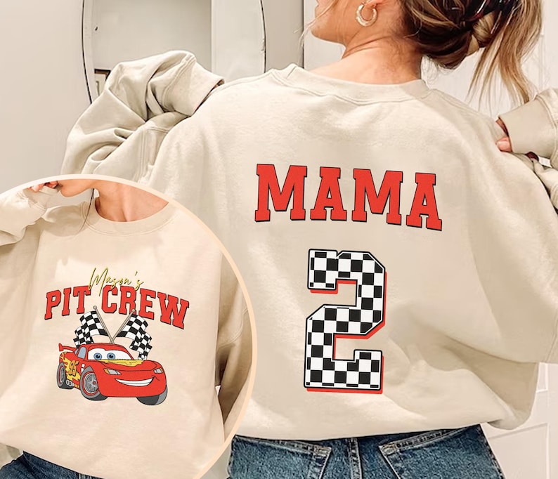 a woman wearing a sweatshirt with the number two on it