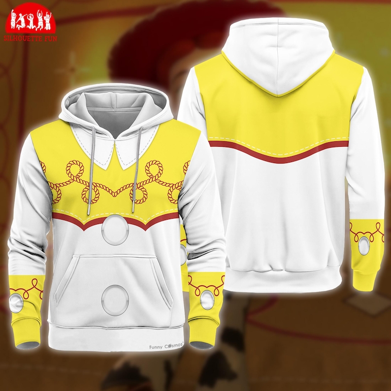 A white and yellow hoodie with red and yellow accents, featuring a design resembling a cowboy hat or a similar western-style headpiece.